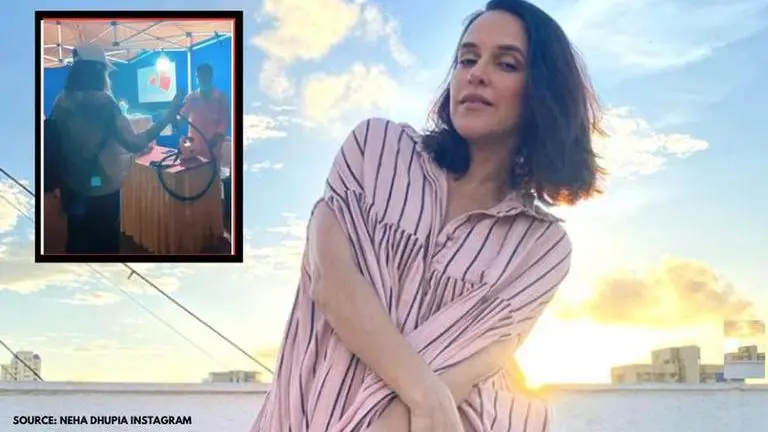 Neha Dhupia gets sanitised before shooting for 'Roadies', says 'Back with safety checks' Neha Dhupia