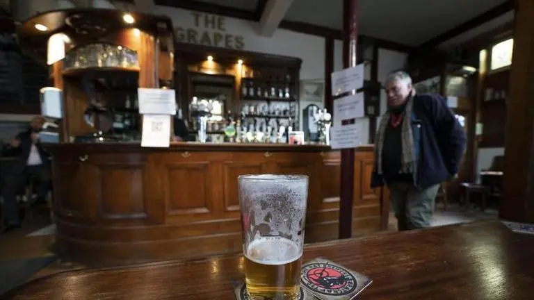 UK defends new virus restrictions; critics say it's too late UK defends new virus restrictions; critics say it's too late