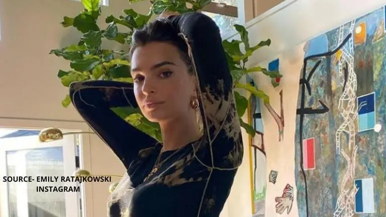 Emily Ratajkowski flaunts her baby bump in a golden bikini; writes 'Angel in my belly' Emily Ratajkowski