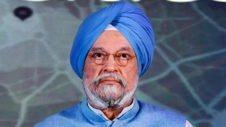 Union minister Hardeep Puri hands over registry papers to 20 unauthorised colony residents