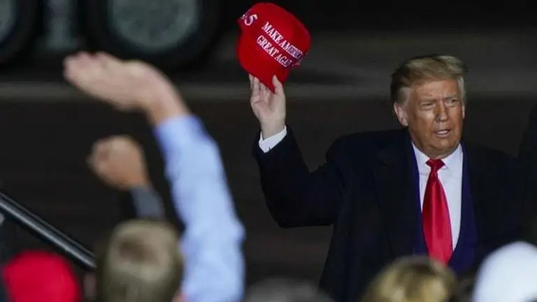 Donald Trump predicts 'tremendous victory' and 'red wave' at a rally in Michigan Donald Trump