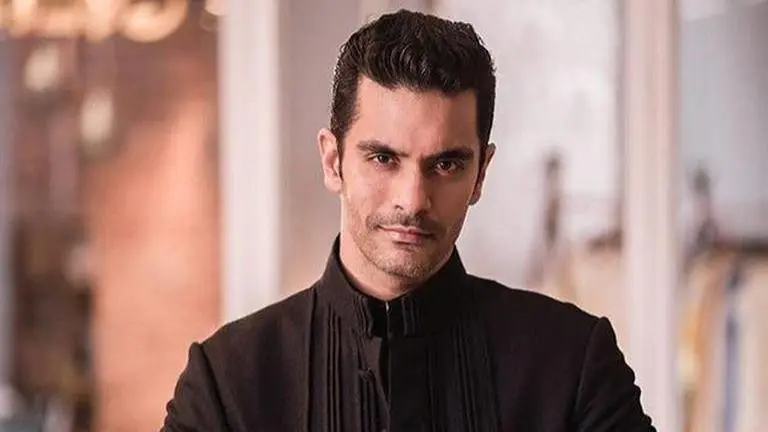 Angad Bedi shares hilarious post with a lawn mower, fans call it 'best workout' Angad Bedi shares hilarious post with a lawn mower, fans call it