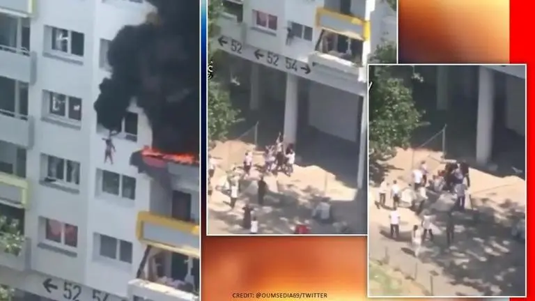 France: Brothers jump from third-storey window of a burning building, caught unharmed France: Brothers jump from burning building, caught unharmed by locals