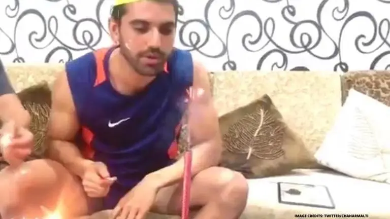 CSK star Deepak Chahar plays PUBG while cutting birthday cake? Sister Malti thinks so CSK