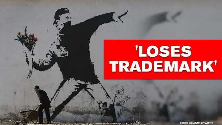 Banksy loses trademark battle of artwork with British greeting card company Banksy loses trademark battle of artwork with British greeting card company