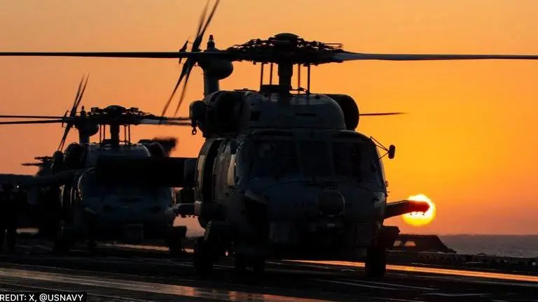 MH60R & MH-60S Sea Hawks prepared for flight ops on deck of USS Gerald R Ford An MH60R SeaHawks and MH-60S SeaHawk prepared for flight ops aboard USS Gerald R Ford