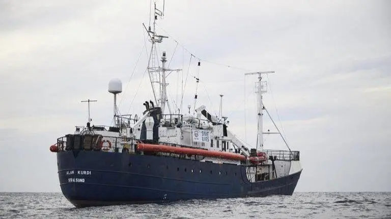 Rescue ship Alan Kurdi anchors off Sardina in bad weather