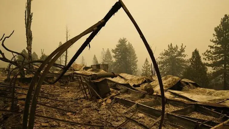 Gusty winds pose continued wildfire threats in California