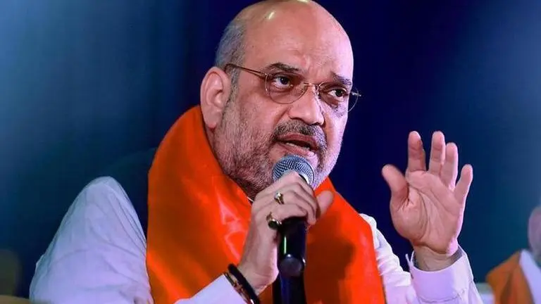 PM devoted to service of the nation, welfare of poor: Amit Shah