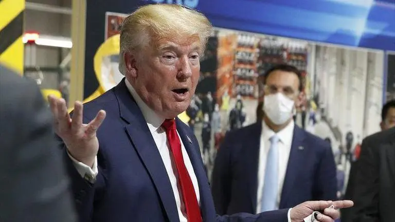 Trump says US won't be closed down for a second time even if cases surge