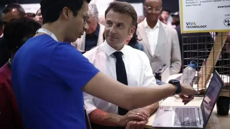 France's Macron calls on to boost AI without impeding the growth French President