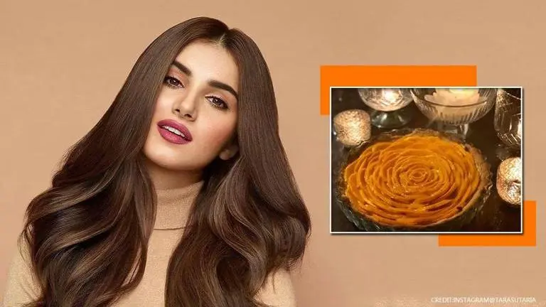 Tara Sutaria bakes a special gift along with sister Pia for parent's anniversary at home