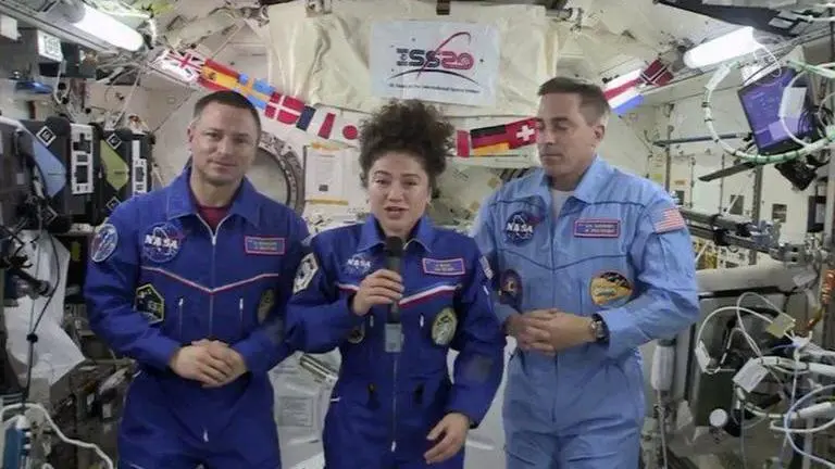 Two NASA astronauts and cosmonaut land after ISS stint