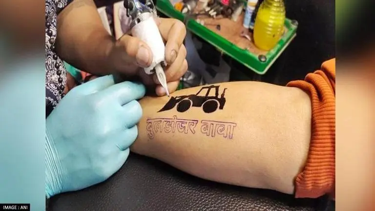 In UP, 'Bulldozer tattoo' emerges as latest celebration after BJP's landslide victory UP