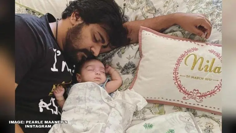 Srinish Aravind puts newborn daughter Nila to sleep with a goofy dance; watch video Srinish Aravind