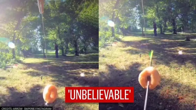 Video: Archer shoots arrow right through doughnut's hole, his precision wins internet Archer