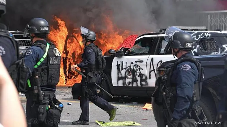 Los Angeles Mayor plans to lift curfew, cut LA police department's budget Los Angeles