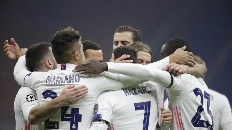 Real Madrid wins 2-0 at 10-man Inter in Champions League