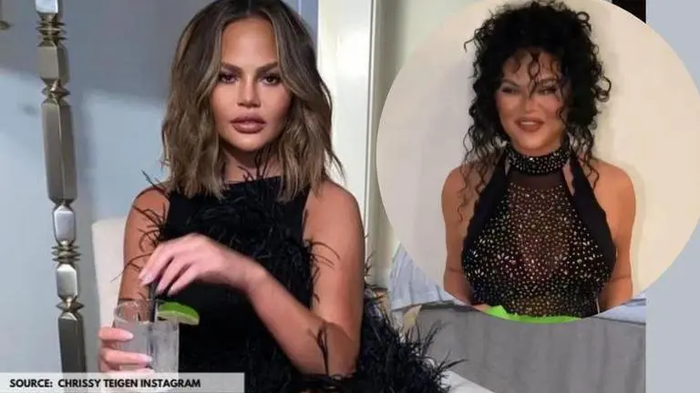 Chrissy Teigen rocks in a sheer body suit & curly hair wig as she channels her inner Cher Chrissy Teigen