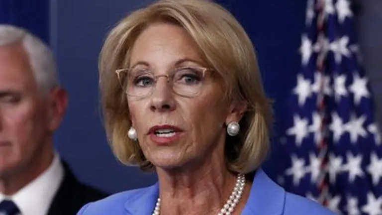 US: States sue DeVos over virus aid to private schools States sue DeVos over virus aid to private schools