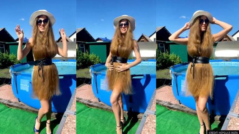 Watch: Girl wears her long hair as a dress in viral video - Times