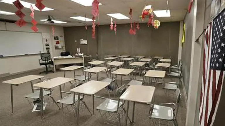 Districts go round and round on school bus reopening plans