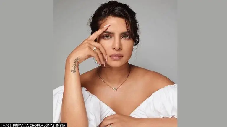 Priyanka Chopra sits with crossed legs in a private jet; Fans love her 'desi girl' style priyanka chopra