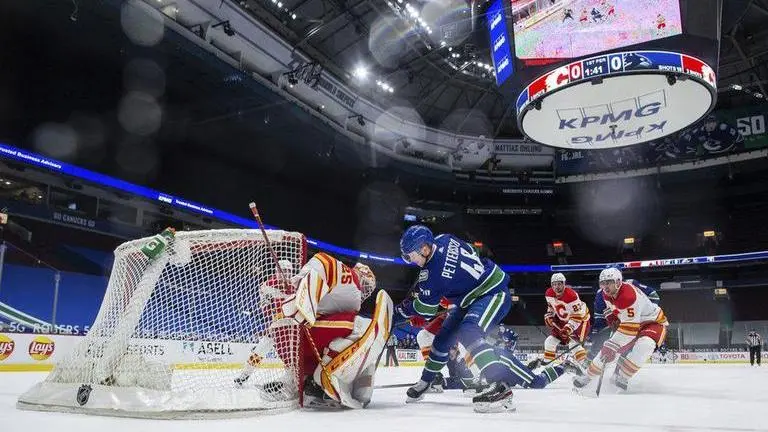 Canucks snap 6-game losing streak with 3-1 win over Flames