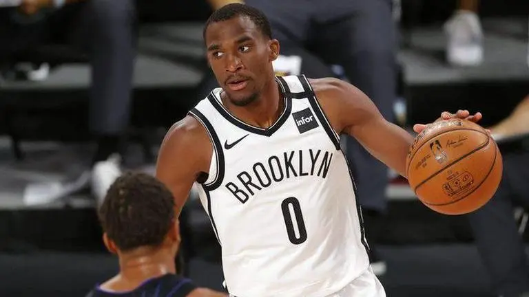 Nets beat Magic 108-96, improve to 5-2 in restart