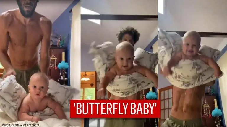 'Picture of happiness': Dad uses unusual pillow trick to wake up his baby; watch video Dad