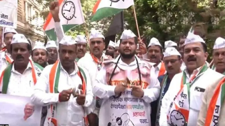 NCP supporters protest outside ED office in Mumbai over summons to Jayant Patil