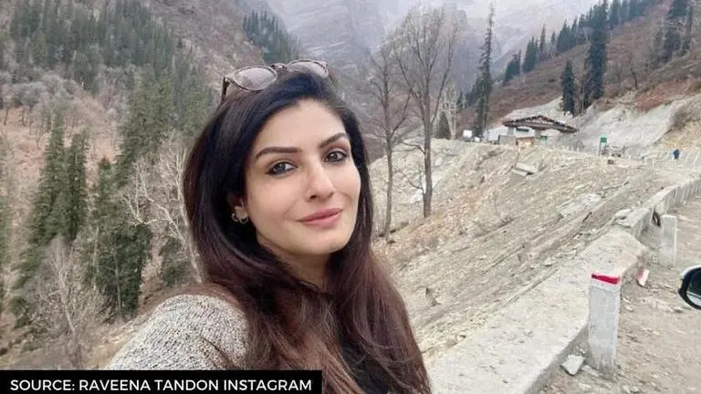 Raveena Tandon enjoys shooting in rain amidst forest while 'walking in clouds'; watch Raveena Tandon