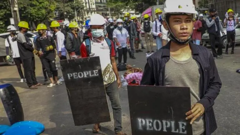 Myanmar protesters, undaunted by killings, march again