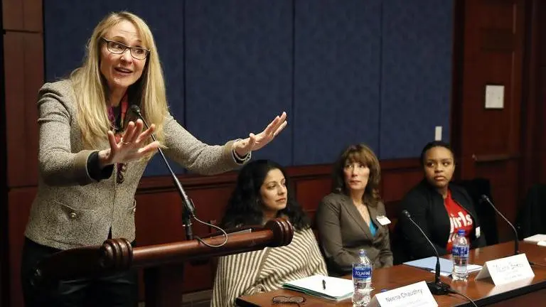 US Olympic swim champion, a rape survivor, fights abuse in sport US