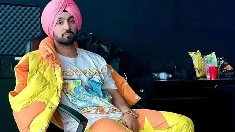 Diljit Dosanjh hits back at fan mocking his pic at fuel station; 'change your mindset' Diljit Dosanjh, Diljit Dosnajh hits at fan, Diljit's pic at fuel station