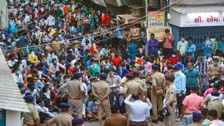 Odisha government cancels 3 trains; migrants hit roads in Surat Odisha