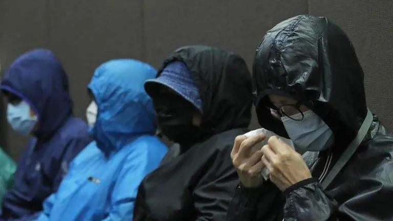 Relatives urge China to return 12 detainees to Hong Kong