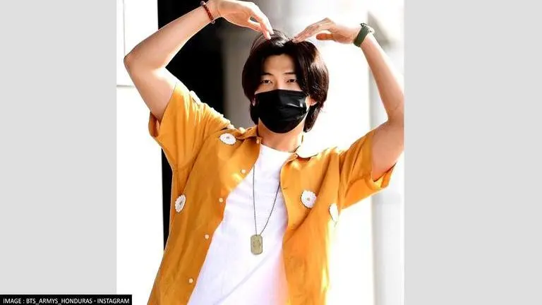 BTS' Kim Namjoon makes breezy appearance at airport; ARMYs go gaga over his hairstyle BTS