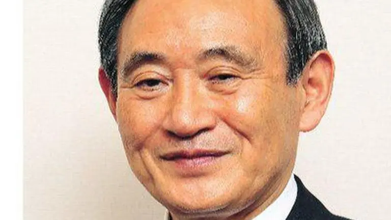 Japan PM hopeful says he may need help from Abe on diplomacy COVID-19