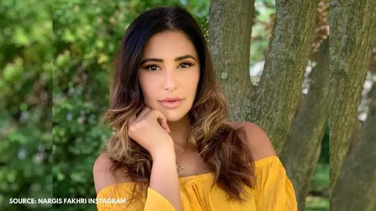 Nargis Fakhri enjoys a healing red clay mud bath to 'detox her life'; See post here Nargis Fakhri