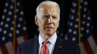 Joe Biden cheers COVID-19 vaccine progress but says masks remain a must US
