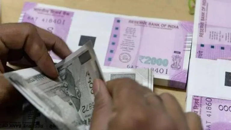 Rupee settles 10 paise lower at 73.90 against US dollar