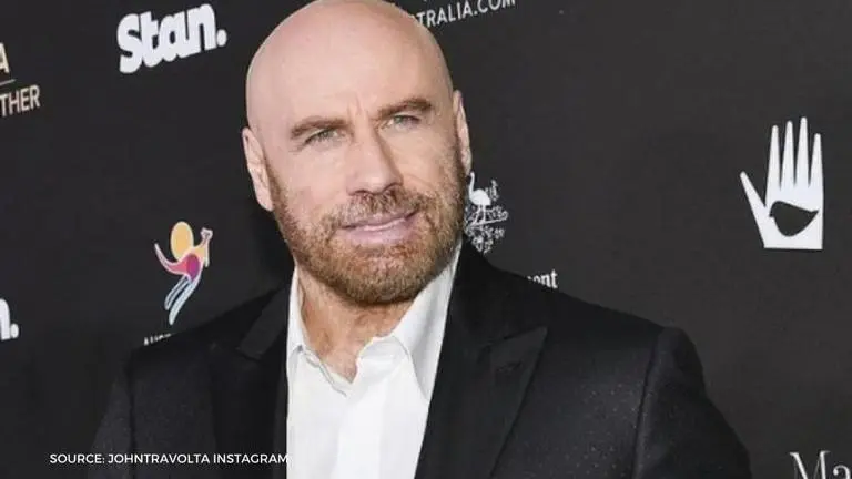 John Travolta shares video with kids celebrating first Christmas since wife Kelly's death john travolta