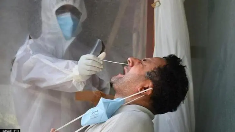 India records 9,765 new COVID cases, recovery rate of 98.35% in 24 hrs amid Omicron scare COVID-19