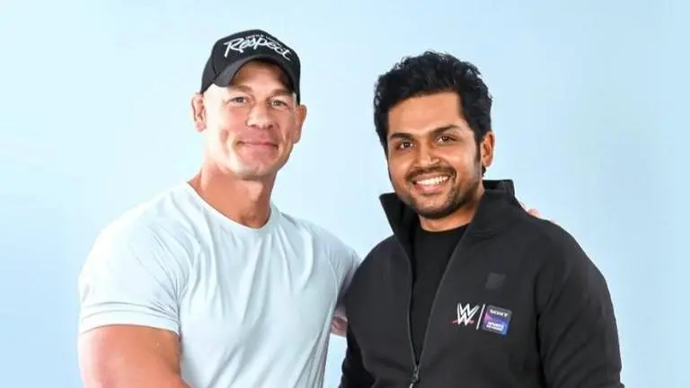 Karthi's photo with John Cena goes viral ahead of WWE Superstar Spectacle in Hyderabad Karthi