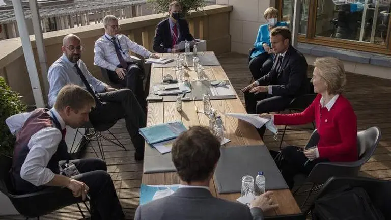 EU leaders leave after extending summit