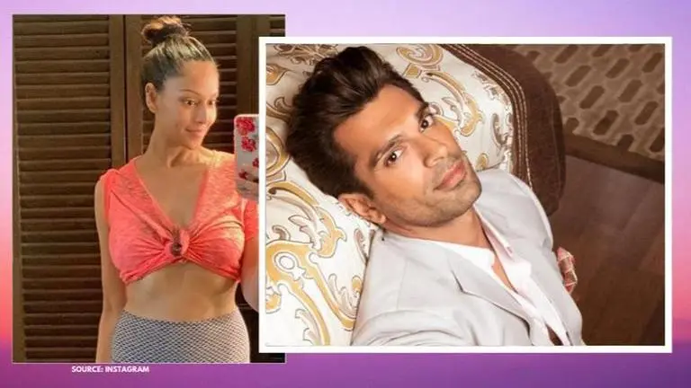 Bipasha Basu flaunts her abs; husband Karan Singh Grover says 'Seems kinda unfair' Bipasha Basu