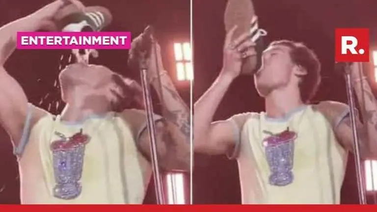 Harry Styles drinks out of shoe during his concert, video goes viral Harry Styles