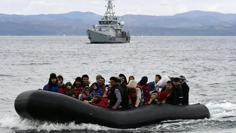 Migrants tear gassed for trying to swim to Greece after Turkey opens western borders Turkey