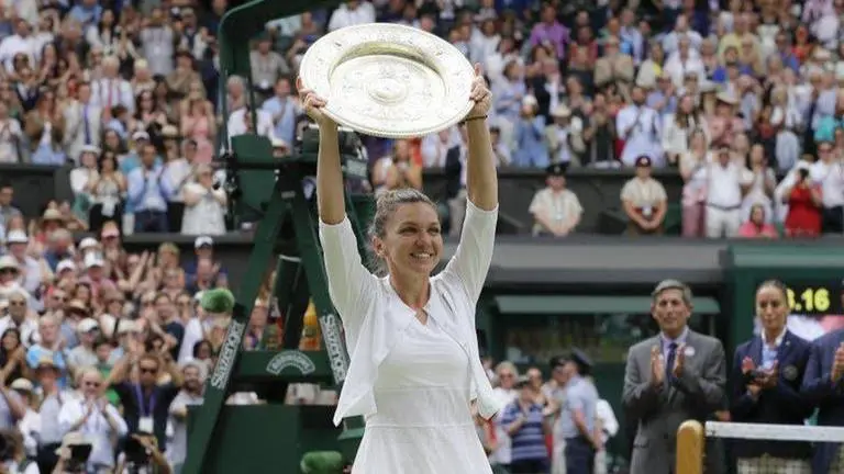 Wimbledon champ Simona Halep says injured foot is pain-free